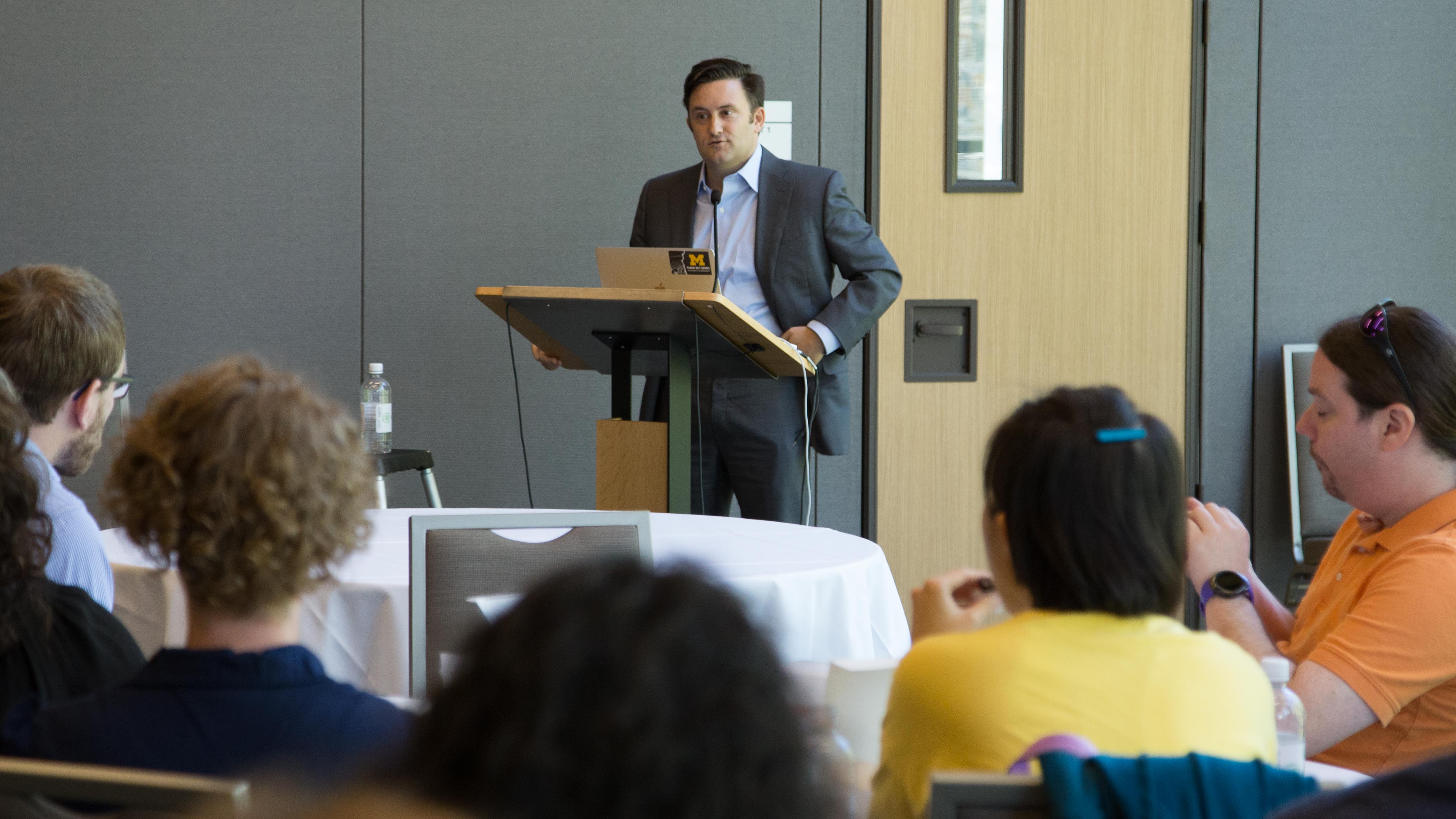 James DeVaney speaking at Duke