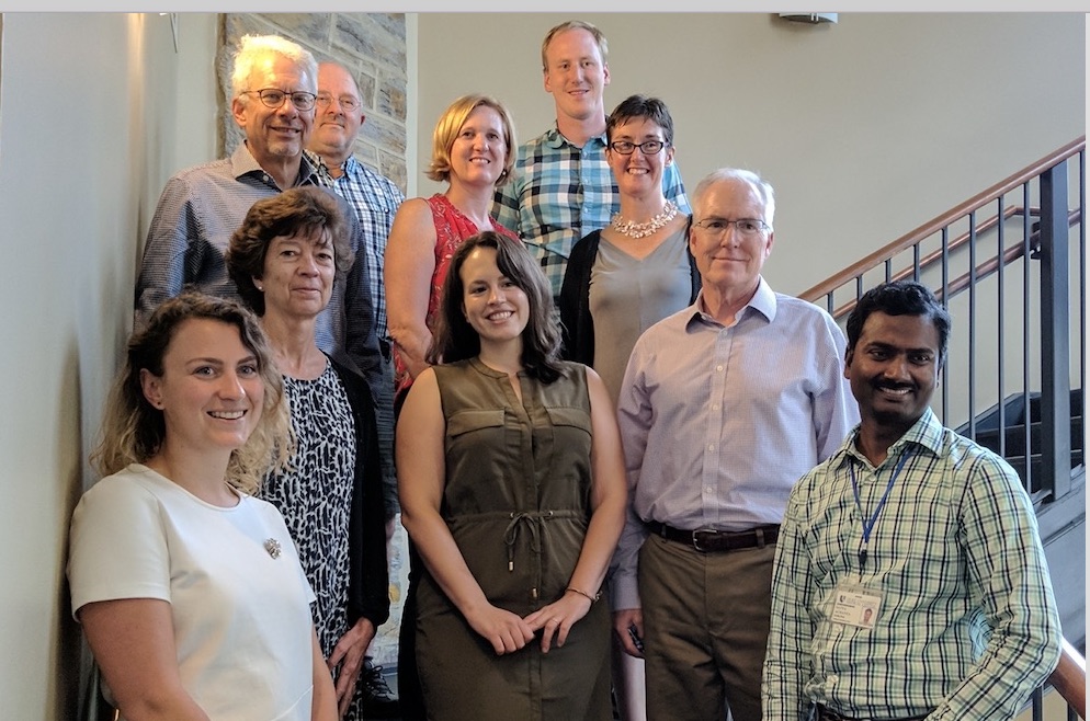 Group photo of CDI participants on stairwell.